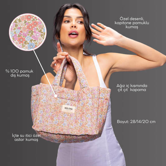 Kompakt boyutlarıyla günlük eşyalar için ideal Soft Garden Petit Tote, elde veya kol üzerinde rahatça taşınabilen modern bir mini çantadır.